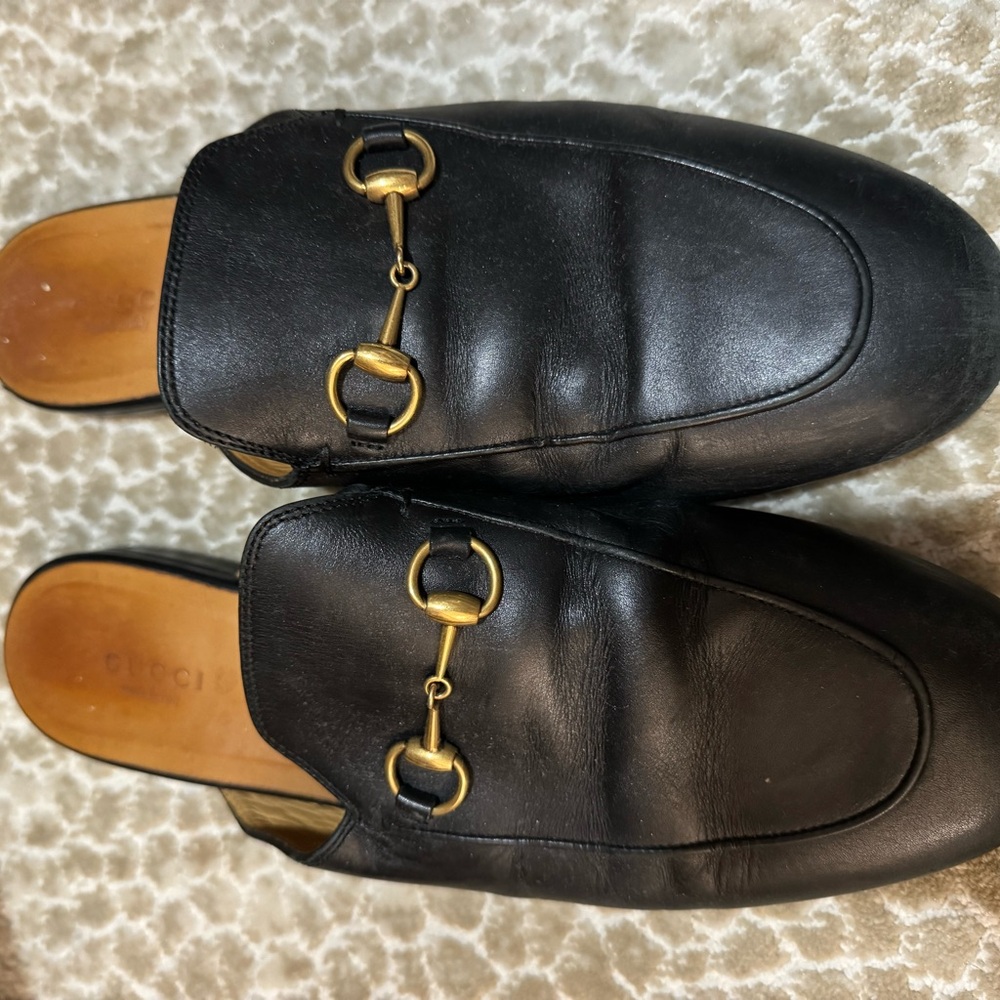 Gucci Black Leather Mules with Gold Accents